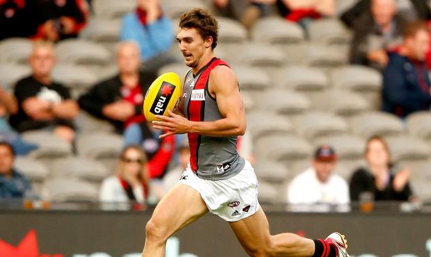 AFL 2015 NAB Challenge - Melbourne v Essendon Lauchlan Dalgleish of the Bombers runs away to score during the 2015 NAB Challenge Week 4 match between the Melbourne Demons and the Essendon Bombers at Etihad Stadium, Melbourne on March 20, 2015. (Photo: Justine Walker/AFL Media)
